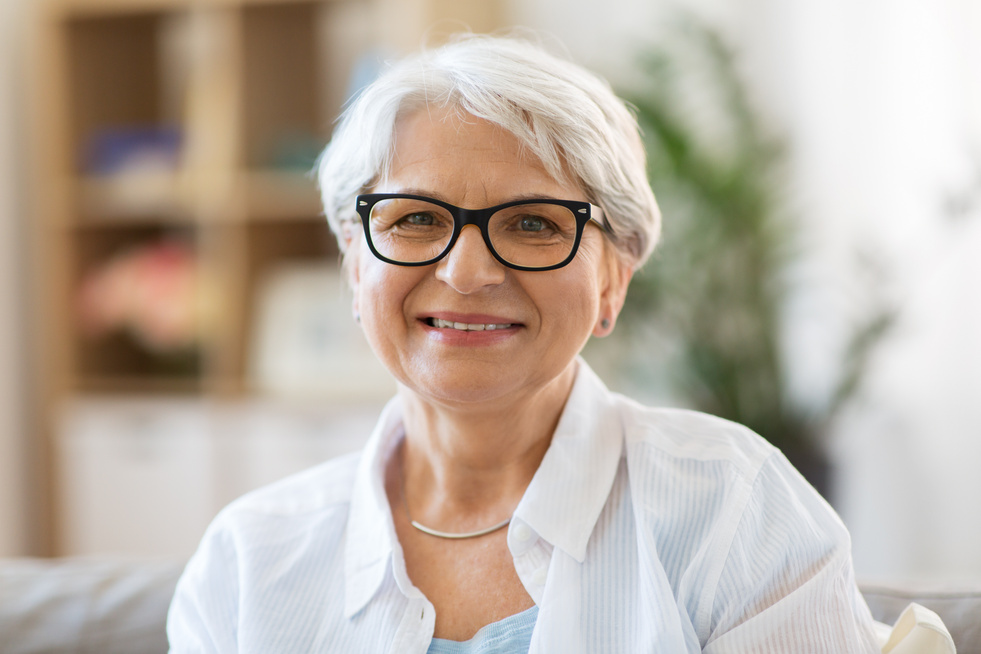 Happy Senior Woman in Glasses