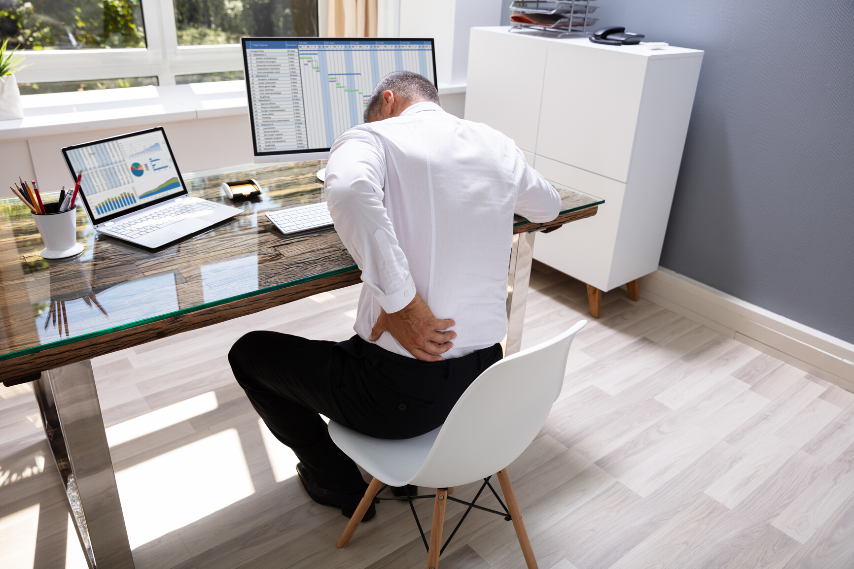 Businessman Suffering From Back Pain